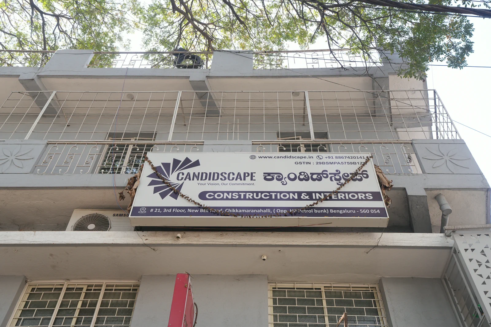 Candidscape Construction & Interiors signboard on the studio building at New BEL Road, Chikkamaranahalli, Bengaluru